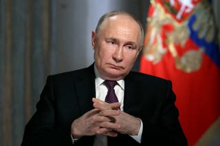Russian president Vladimir Putin gives an interview at the Kremlin in Moscow